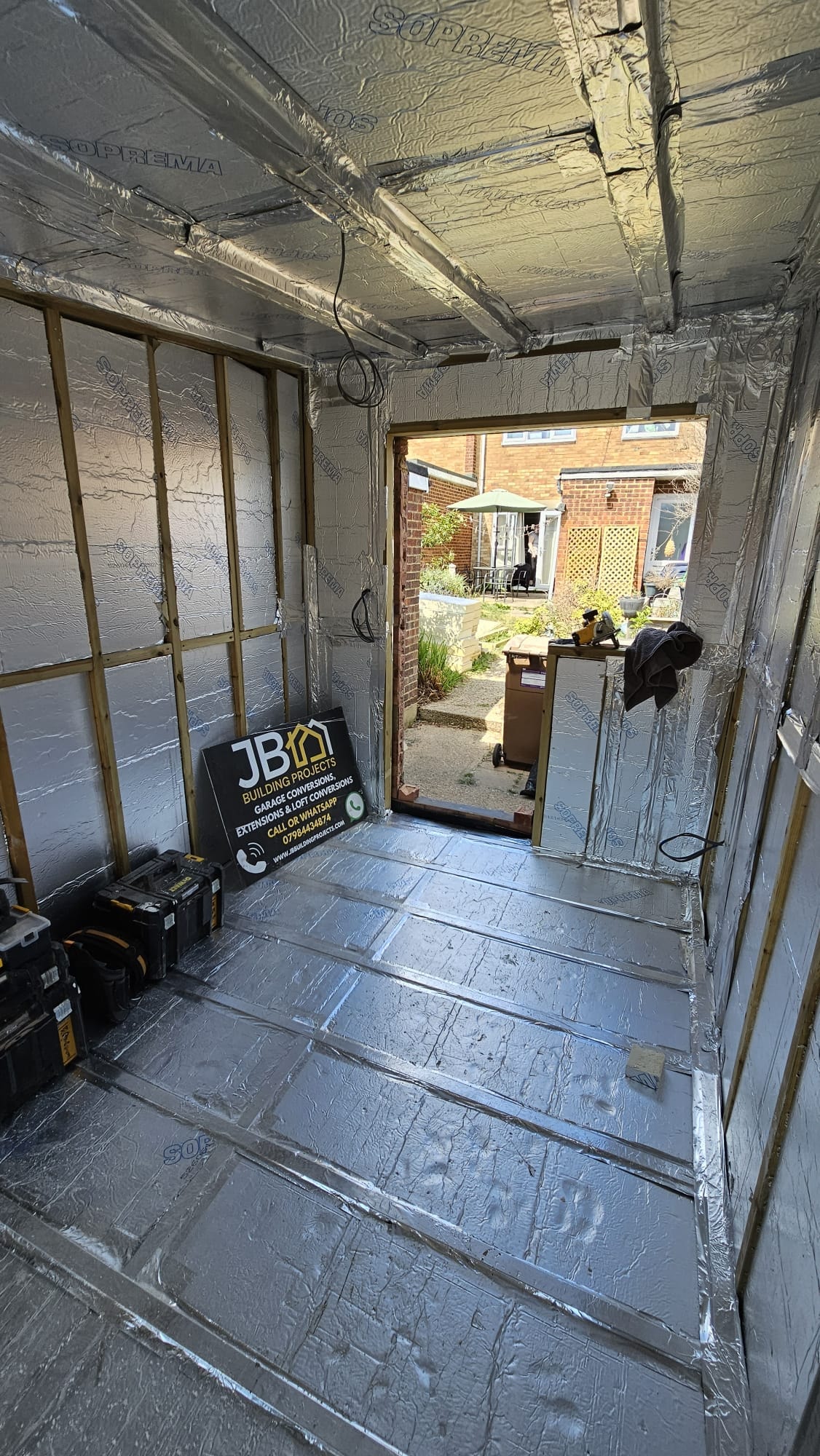 Insulation fitted across floor, walls and suspended ceiling with aluminium-taped joints — Chelmsford