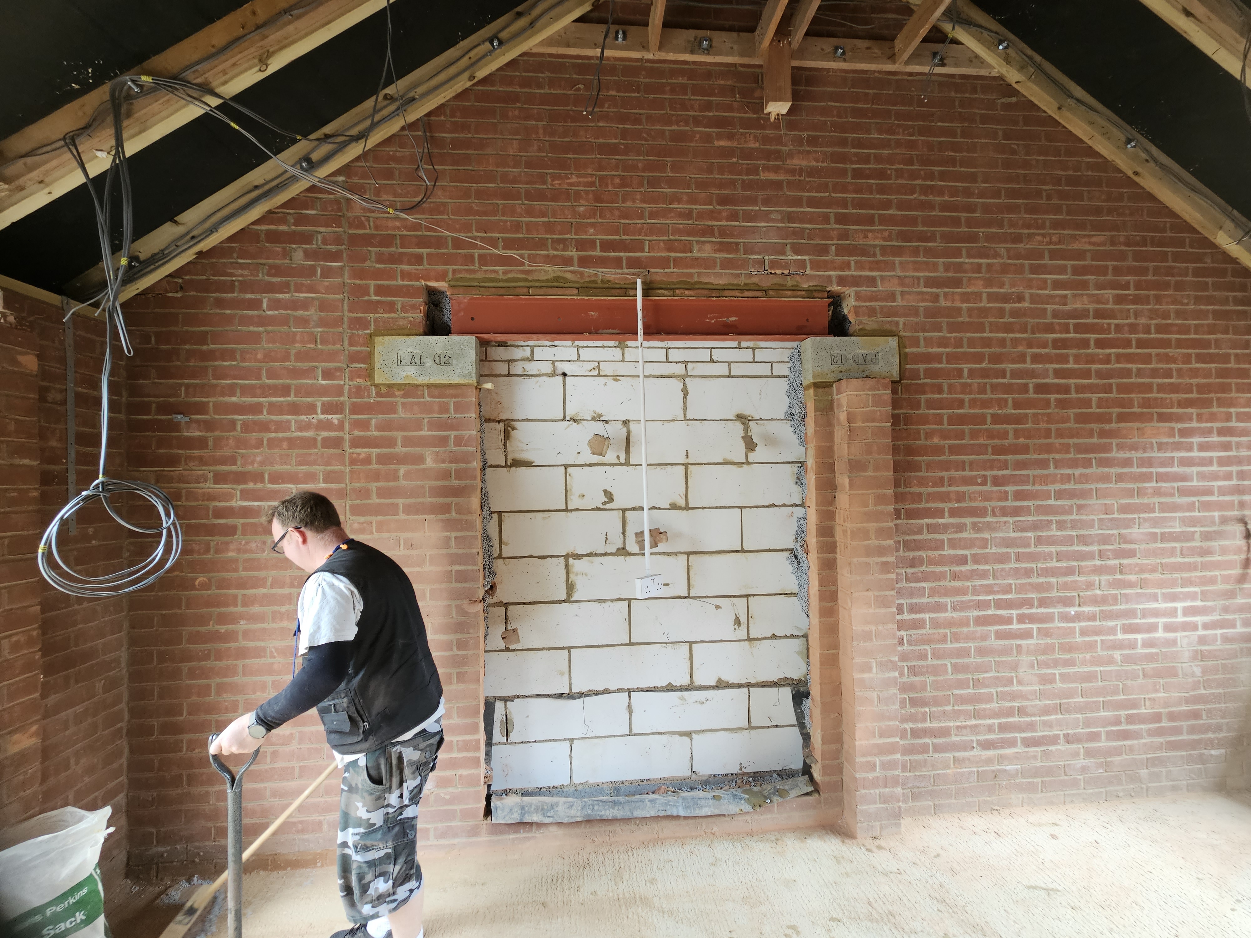 Structural opening during the attached Huxley Close garage conversion