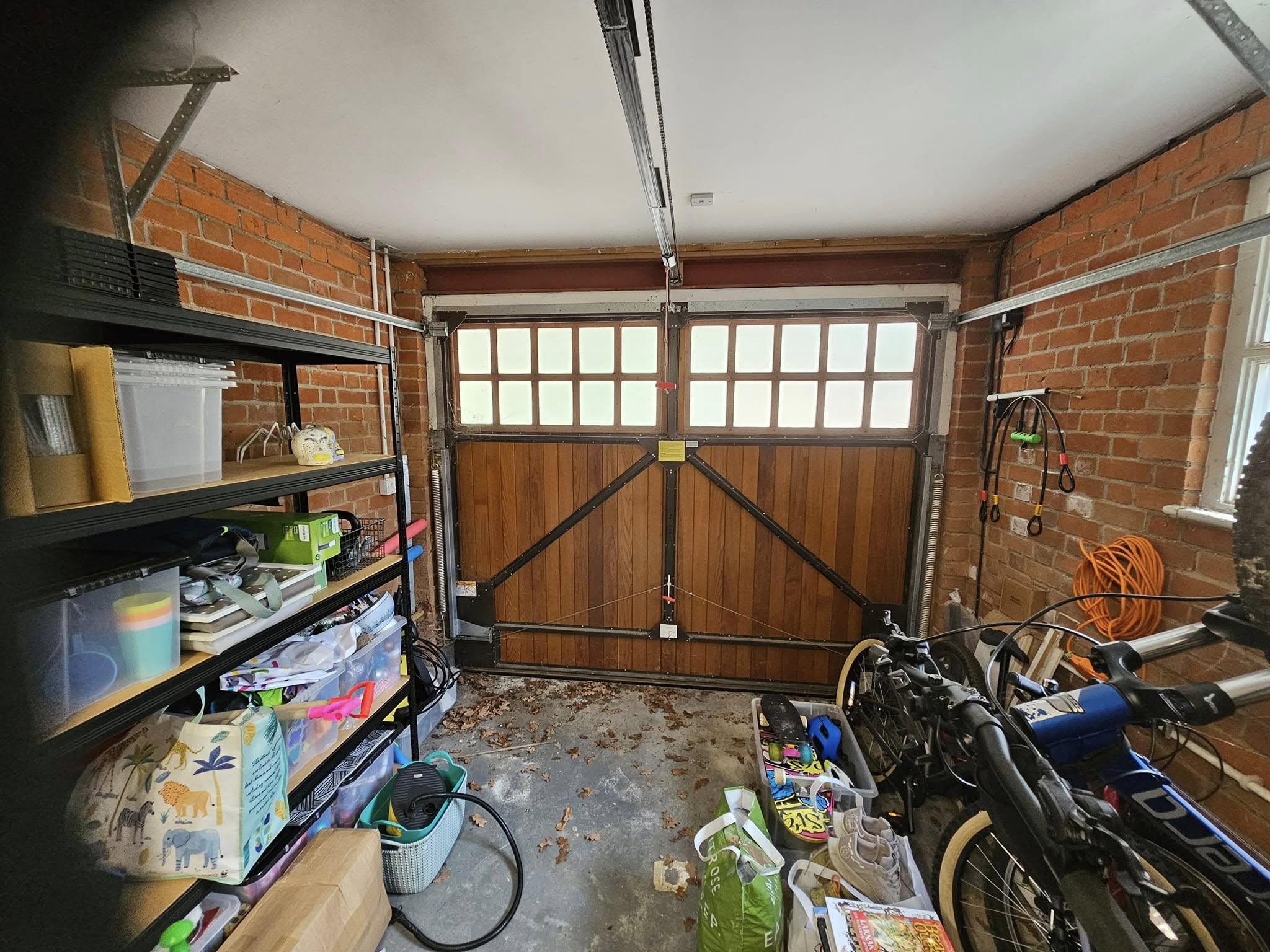 Single garage before conversion — original interior, Hertfordshire