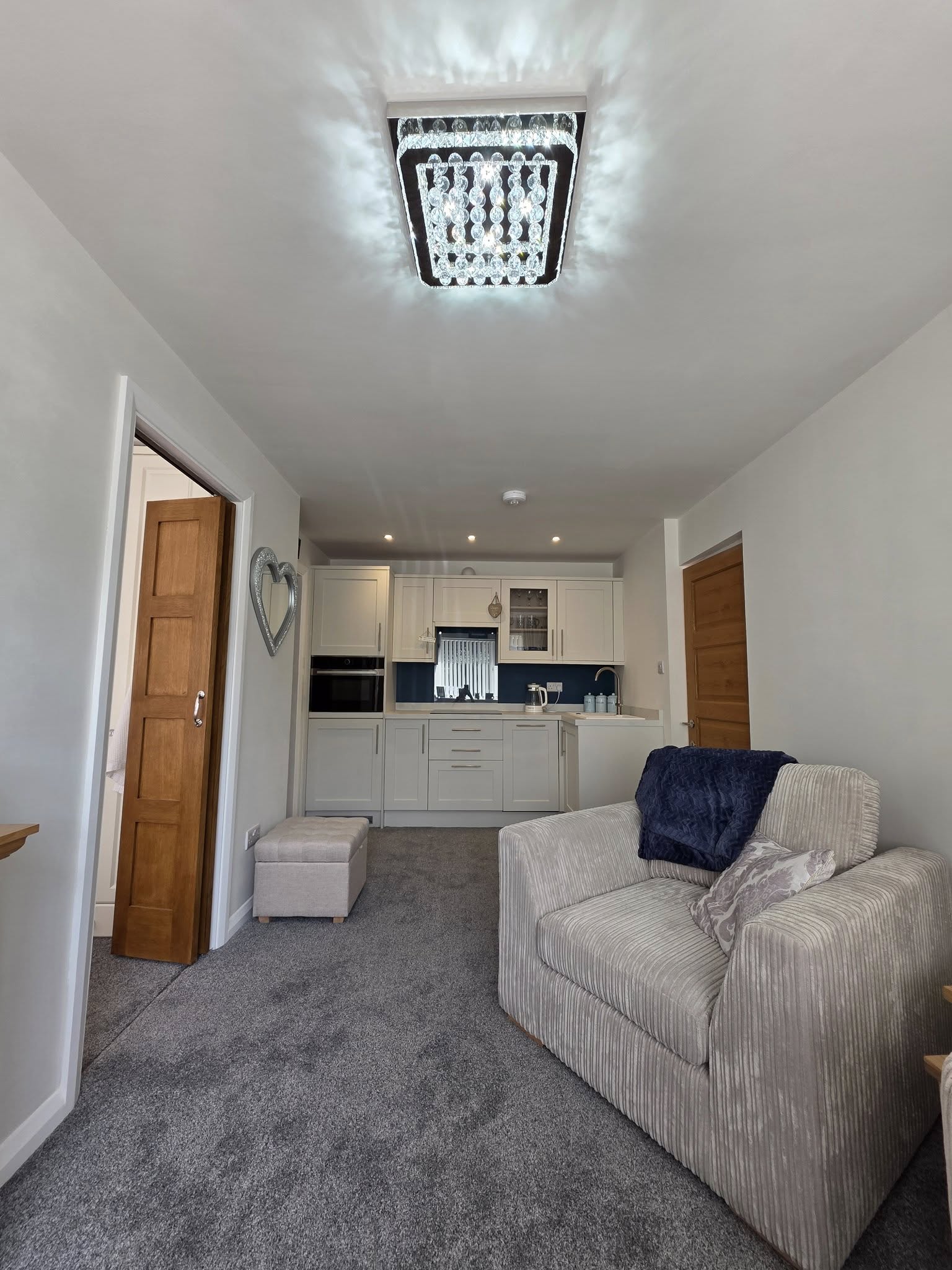 Finished lounge and kitchenette in a Chelmsford double garage conversion