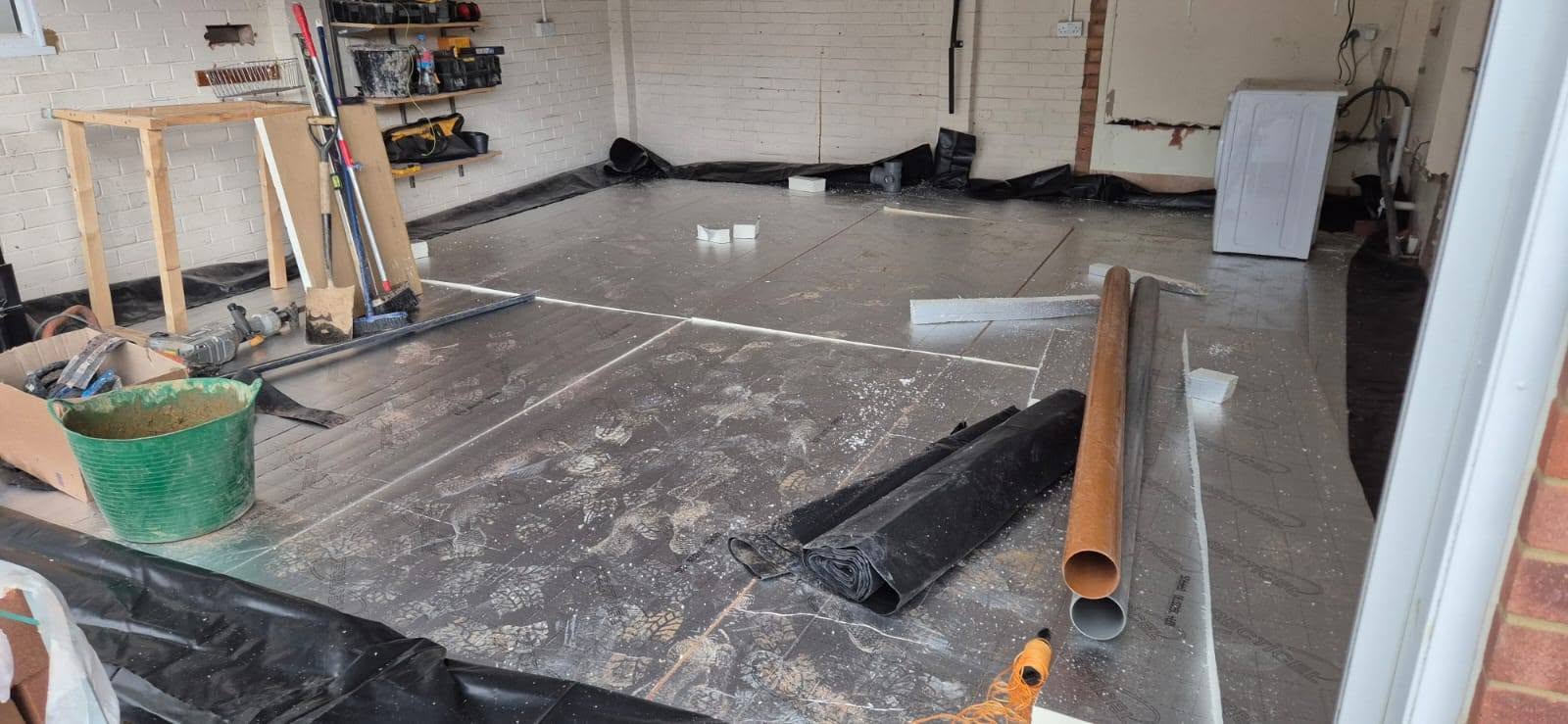 Floor insulation and screed preparation during a Chelmsford double garage conversion