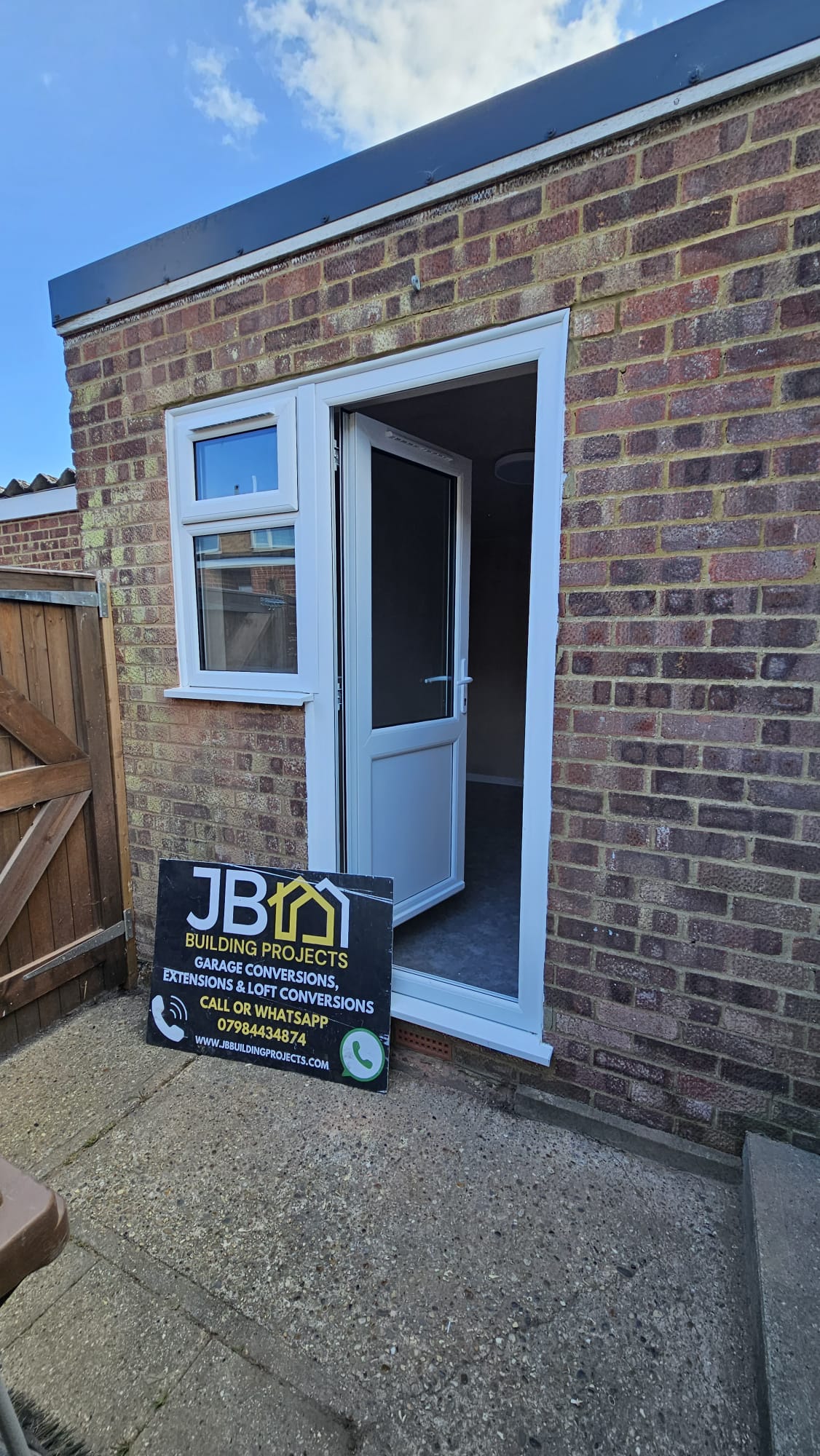 New rear door and window for a partial garage conversion in Chelmsford, with front garage storage retained