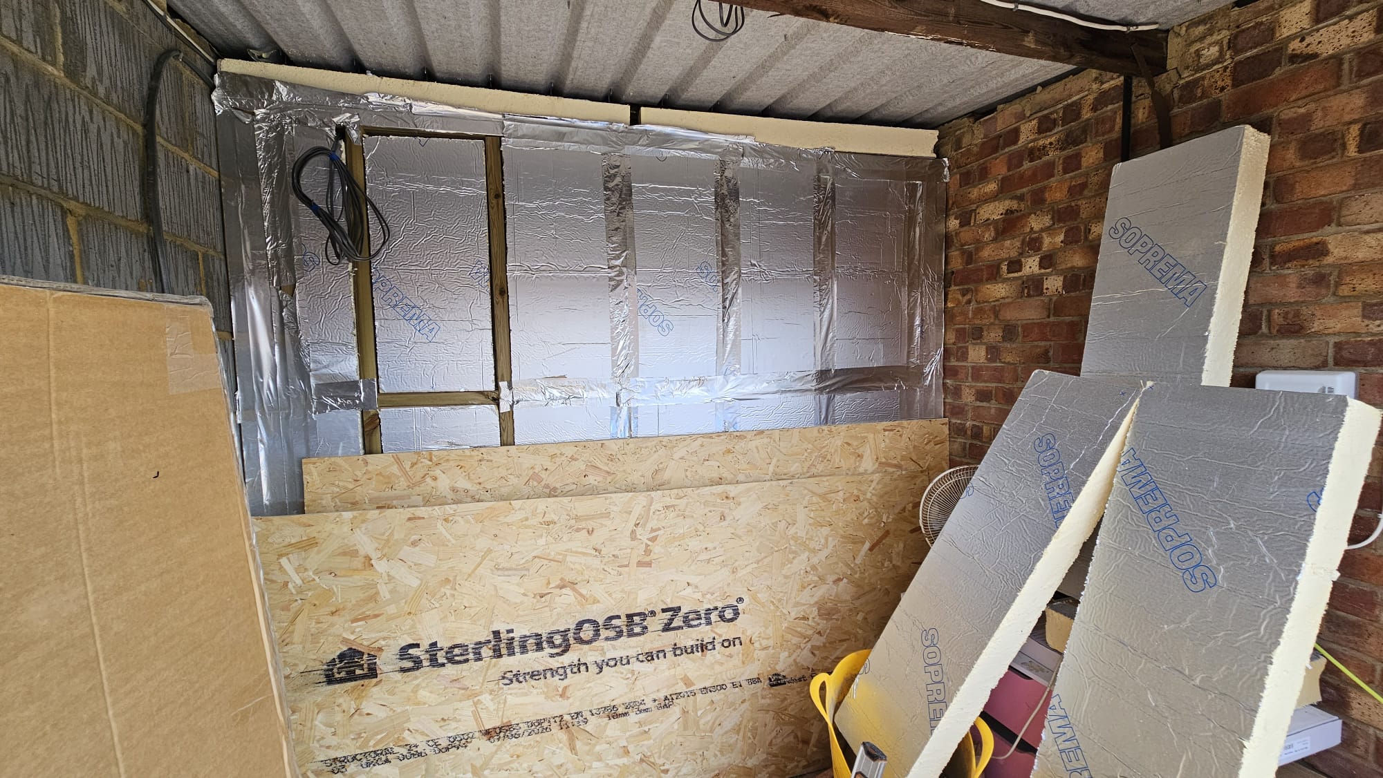 Dividing wall between the converted room and retained garage storage in Chelmsford