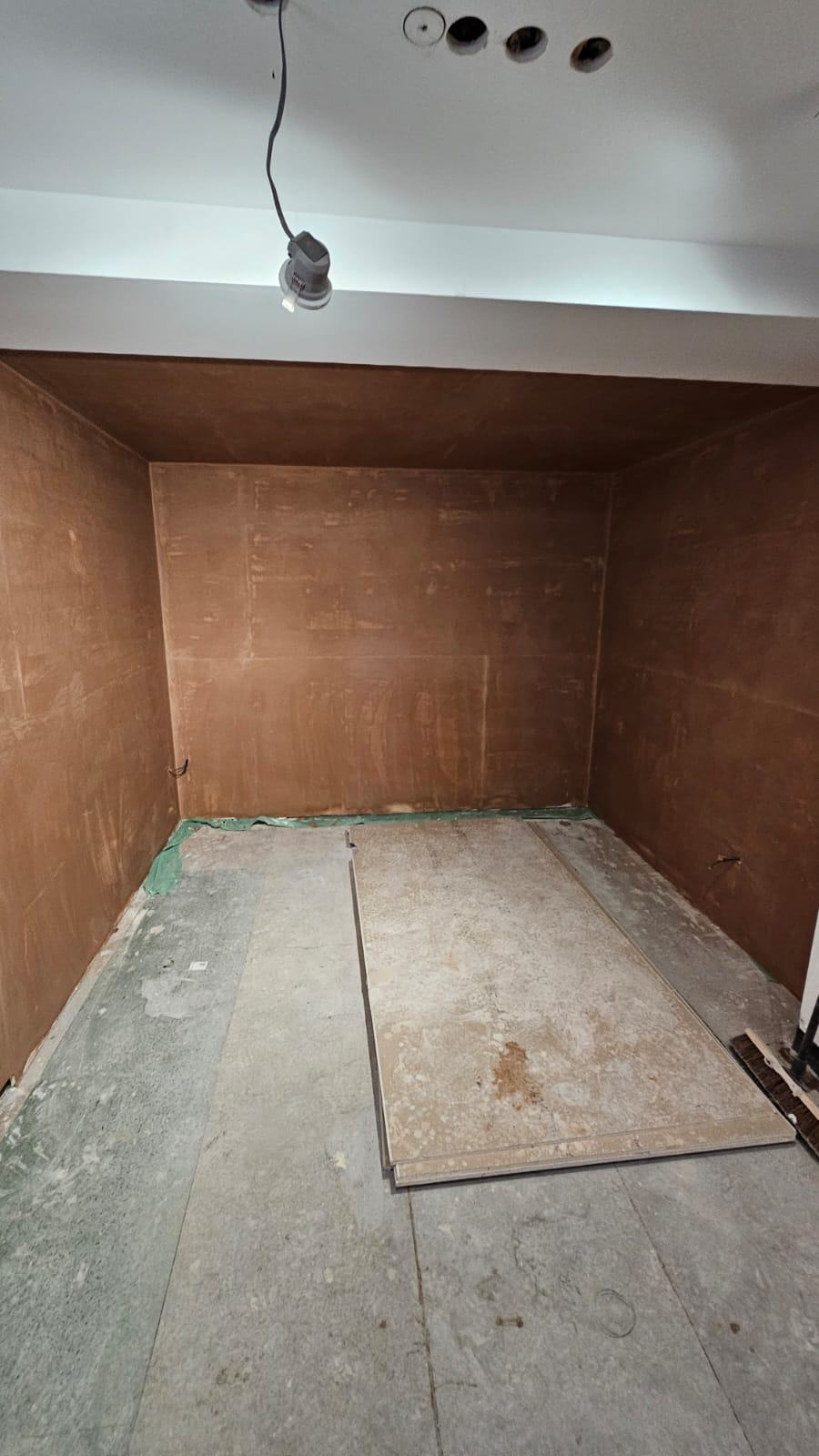 Fresh skim plaster in the office alcove before decoration and installation of the bespoke carpentry units